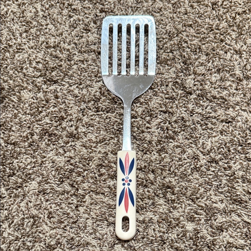 Temptations metal spatula